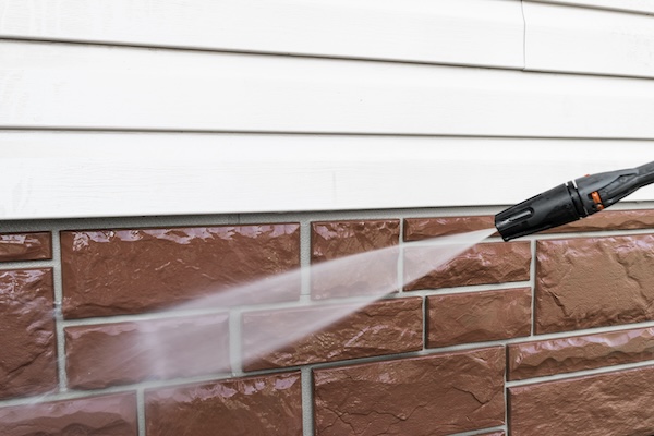 Exterior of Home Cleaning with Pressure Washer